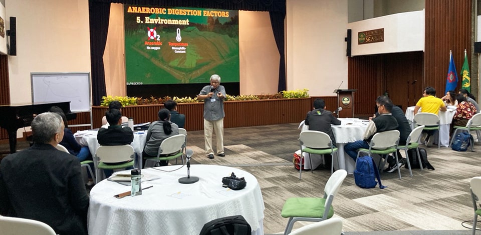 Dr. Luis engaged with the participants while discussing the vital factors influencing anaerobic digestion.