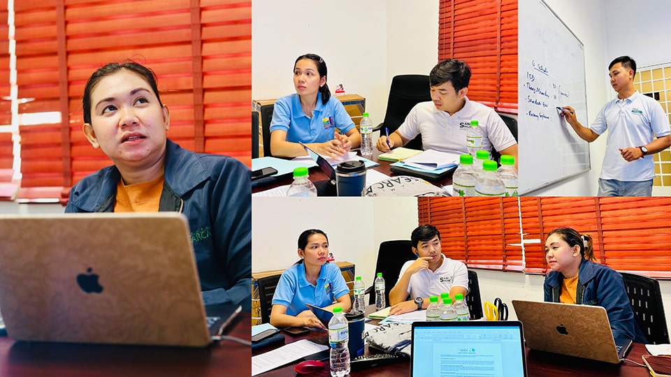Ms. Anna Gale Vallez (left), SEARCA Program Specialist, and Dr. Leangsrun Chea (top right), CE SAIN Agricultural Technical Manager, discuss with enumerators during the Baseline Assessment Workshop.
