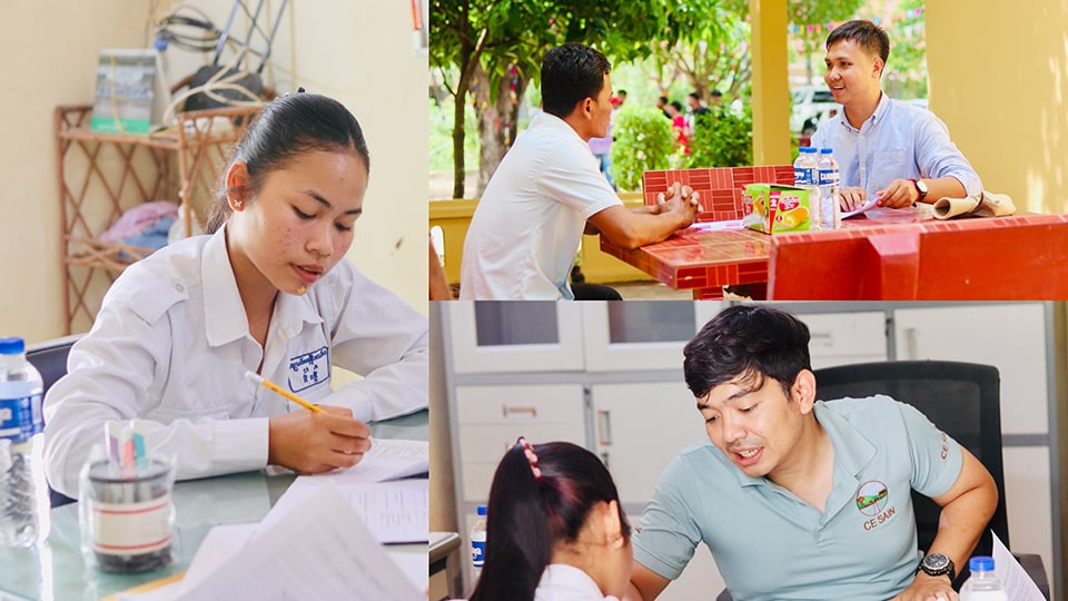 Dr. Leangsrun Chea (top right) and Mr. Soten Chea (bottom right), both of CE SAIN, with students and a parent, conduct the pre-testing of questionnaires at Raksmey Sophanna High School in Kampong Thom, Cambodia.
