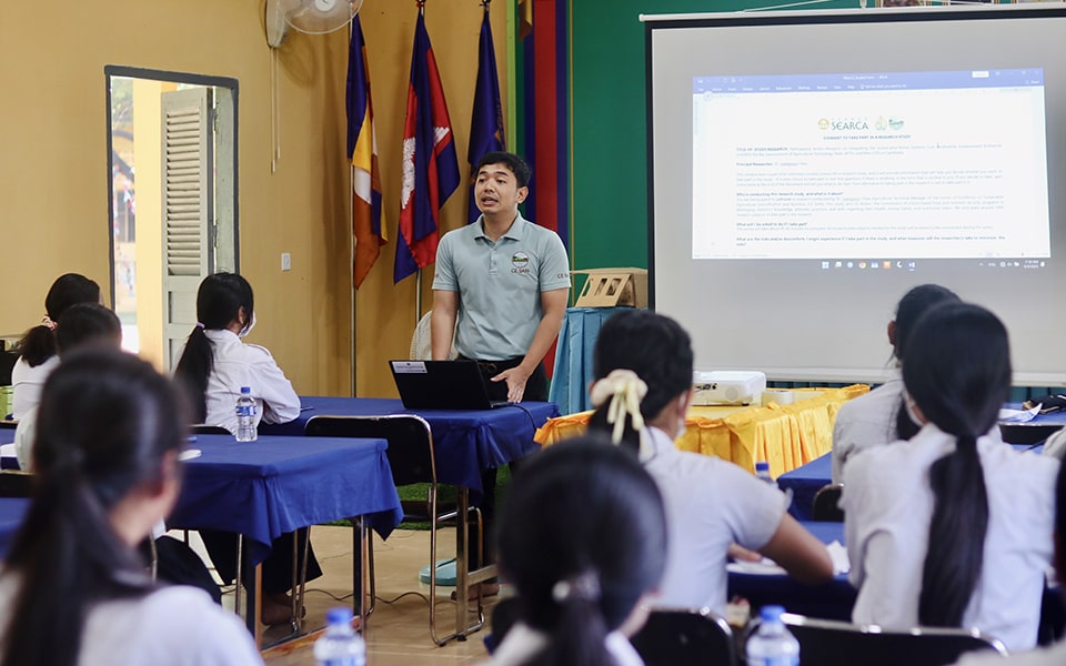 An enumerator from CE SAIN facilitates the survey of students at Raksmey Sophanna High School in Kampong Thom, Cambodia.