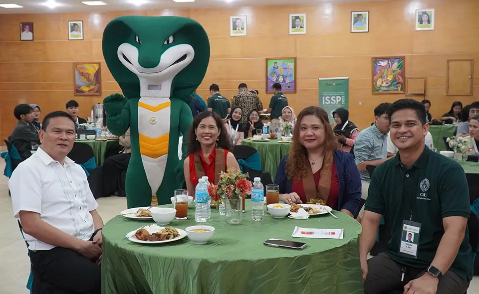 From left: Dr. Evaristo Abella, CLSU President; Siel, the Green Cobra, CLSU’s official mascot; Dr. Khin Mar Cho, CLSU Adjunct Fellow; Ms. Blessie Saez of SEARCA, and Dr. Parsons Hail, CLSU-IAO Director