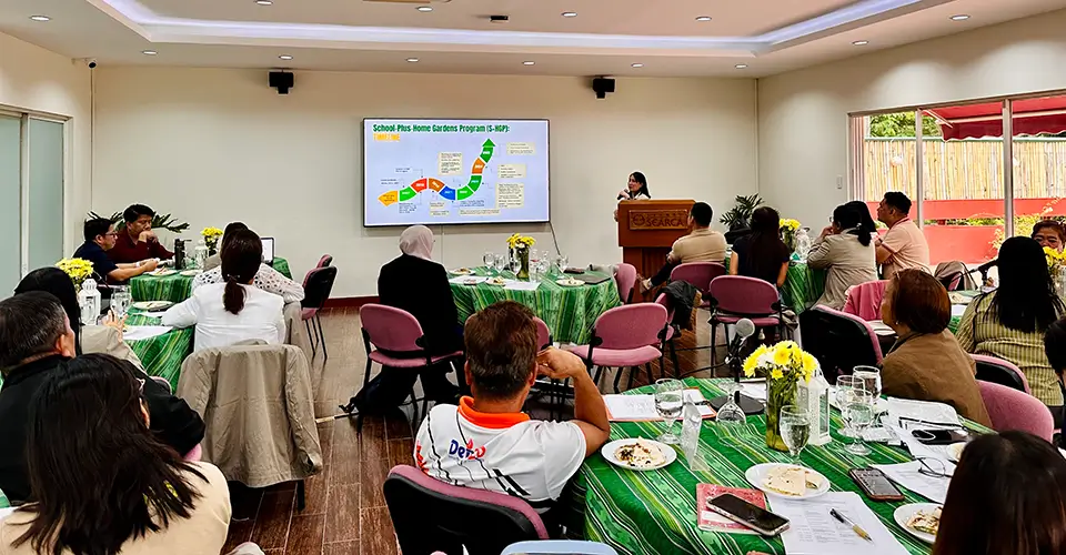 Dr. Gerlie Tatlonghari (at rostrum) provides an overview of the project and its timeline.