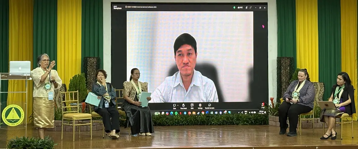 Plenary Session 2 participants (from left) Dr. Leticia Afuang of the Mindoro Biodiversity Conservation Foundation, Inc.,, Dr. Maria Antonia Tuazon of FAO, Ms. Christine Heidi Garcellano of DepEd, Dr. Lyda Hok of RUA  (on screen), Dr. Sarah Maass of K-State), and Dr. Jennifer Marie Amparo of UPLB discuss “Curriculum for the Future: Policy Directions on Biodiversity, Resilience, and Regenerative Agriculture,” with Afuang serving as session chair.