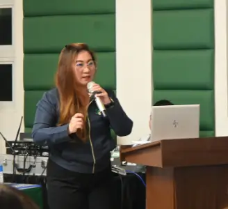 Ms. Rochella Lapitan, SEARCA Program Specialist, facilitates dialogue and guides the discussion among farmers, officials, and experts.