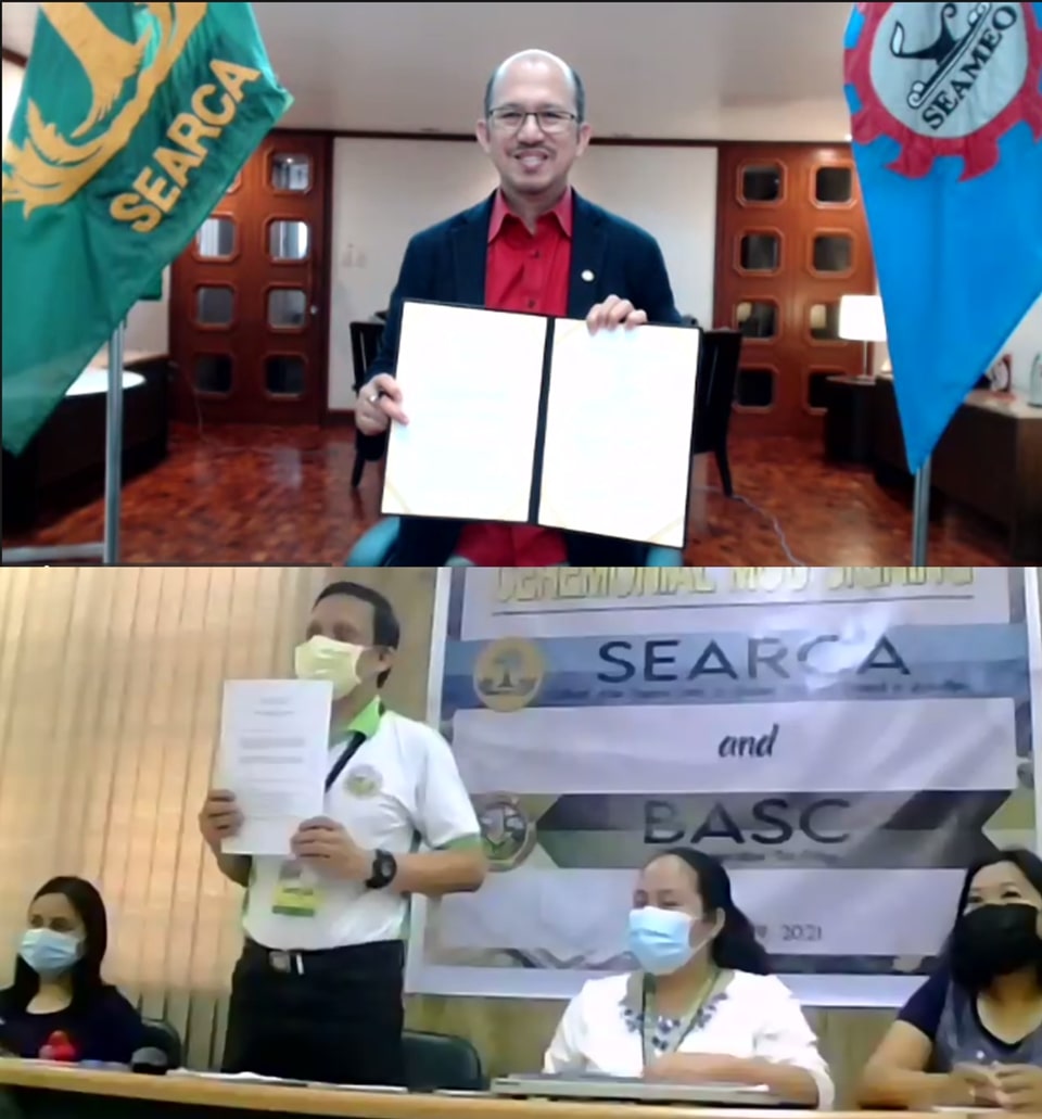 SEARCA Director Dr. Glenn B. Gregorio (top) and BASC President Dr. Jameson H. Tan, each holds a copy of the MOU between SEARCA and BASC that they signed in a virtual ceremony on 29 March 2021.