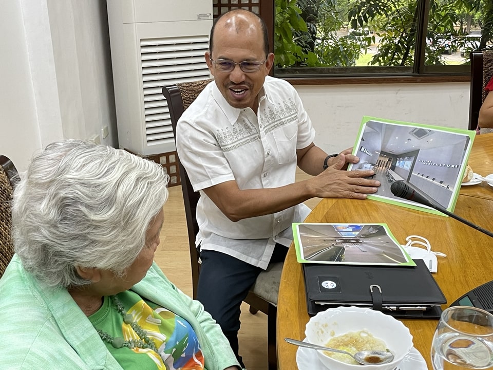 Dr. Gregorio (right) presents to Secretary Briones the SEARCA Hub for Agriculture and Rural Innovation for the Next Generation (SHARING), one among the learning facilities of SEARCA to support innovation and agri-incubation.