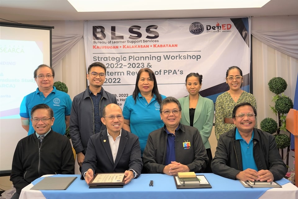Philippine Department of Education (DepEd) Undersecretary for Administration Alain Del B. Pascua (seated, second from right); Dr. Lope B. Santos, DepEd-Bureau of Learner Support Services (BLSS) Director (seated, rightmost); Dr. Maria Corazon C. Dumlao, DepEd-BLSS-School Health Division Chief Health Program Officer (standing, center); and DepEd-BLSS-School Sports Division (SSD) Chief Education Program Specialist, Cesar S. Abalon (standing, leftmost) with the SEARCA delegation composed of Dr. Glenn B. Gregorio, SEARCA Director (seated, second from left); Assoc. Prof. Joselito G. Florendo, SEARCA Deputy Director for Administration (seated, leftmost); Ms. Ma. Victoria D. Bravo, Executive Assistant, Office of the Deputy Director for Programs (standing, rightmost); Mr. Nathan P. Felix, Senior Associate, Public Relations (standing, second from left); and Ms. Katerina M. Vargas, Senior Associate, Events and Visitors (standing, second from right).