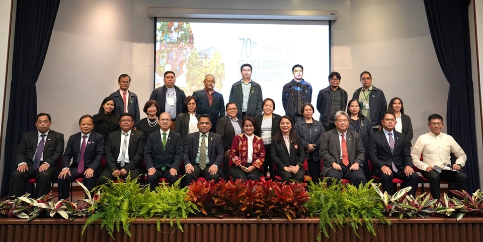 The 70th SEARCA Governing Board (GB) together with Dr. Margarita Consolacion C. Ballesteros (seated, fifth from right), Director of the International Cooperation Office of the Philippine Department of Education (DepEd), and the Guest of Honor; Dr. Glenn B. Gregorio (seated, fourth from left), SEARCA Director; Assoc Prof. Joselito G. Florendo (seated, rightmost), SEARCA Deputy Director for Administration and Chair of the GB Secretariat; and Dr. Ethel Agnes P. Valenzuela (seated, fourth from right), SEAMEO Secretariat (SEAMES) Director; and the SEARCA Management Committee.