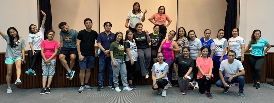 SEARCA employees together with the SEARCA Health and Wellness Committee pose for a picture after the Anniversary workout.