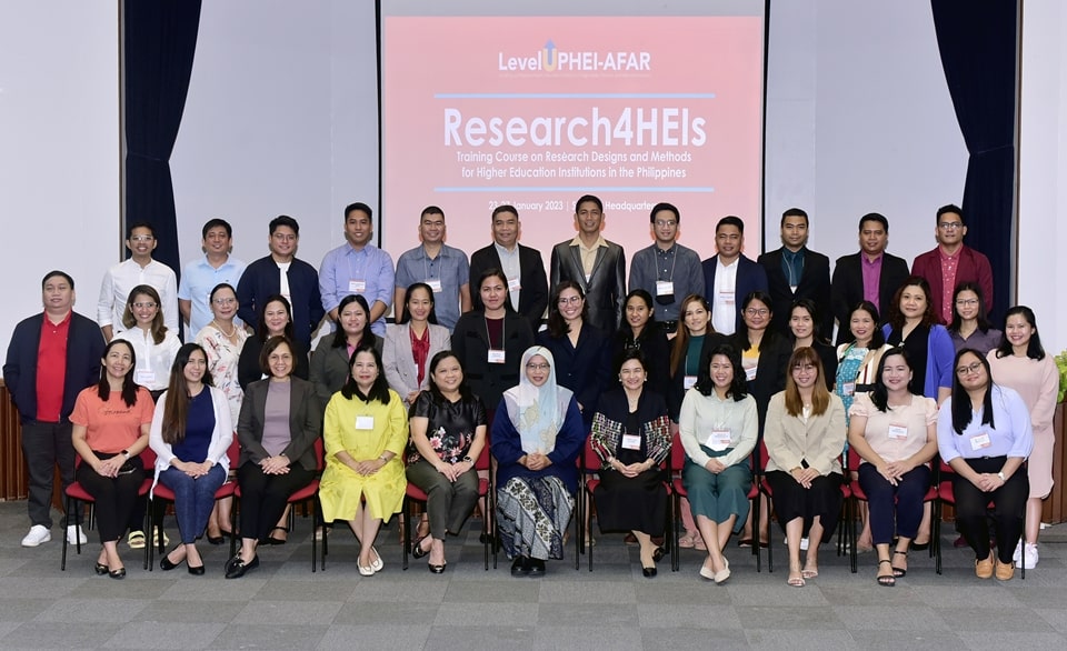 Representatives from academic institutions across the country pose for a group photo with SEARCA heads, resource persons, and organizers during the opening of the Research4HEIs on 23 January 2023 at the SEARCA Headquarters.