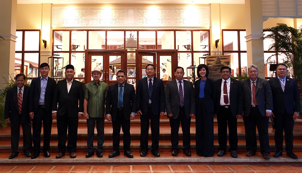 Dr. Glenn Gregorio, Center Director, SEAMEO SEARCA (fourth from the left) poses with the SEAMEO SEARCA GB country representatives from Brunei, Cambodia, Indonesia, Lao PDR, Malaysia, Myanmar, the Philippines, Singapore, and Thailand and Ms. Pintip Iamnirath, Deputy Director for Administration and Communication of the Southeast Asian Ministers for Education Organization Secretariat (SEAMES).