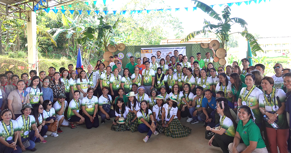 Tabugon Farm School faculty and students, DepEd-Kabankalan, and local government units welcome SHGBEE2 organizers and participants.