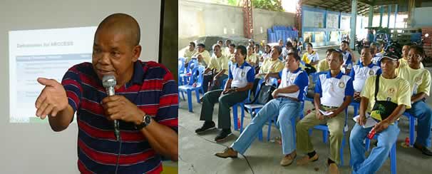 Prof. Williams (left) presents the outputs delivered by the SEARCA Project Team before the members of Talabutab Norte Primary Multi-Purpose Cooperative during their special General Assembly on 13 August 2014 in Brgy. Talabutab Norte, General Natividad, Nueva Ecija.