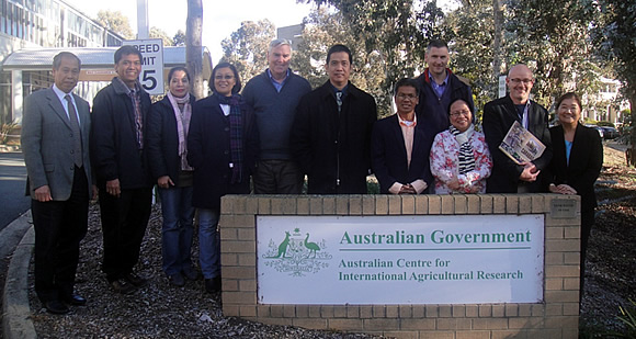 Participants pose for a group photo with ACIAR officials in Canberra, namely: Dr. Mike Nunn, Research Program Manager for Animal Health (fifth from left); Dr. Andrew Alford, Research Program Manager for Impact Assessments (fourth from right); and Dr. Rodd Dyer, Research Program Manager for Agribusiness (second from right).