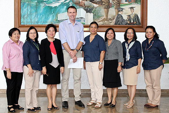 Mr. David Dutton (fourth from left), Minister and Deputy Head of Mission of the Embassy of Australia to the Philippines, and Ms. Cecilia O. Honrado (leftmost), Philippine Manager of the Australian Centre for International Agricultural Research (ACIAR), visited SEARCA on 25 June 2014. They were received by Dr. Virginia R. Cardenas (third from left), Dr. Bessie M. Burgos (second from left), and (from right) Ms. Maria Monina Cecilia N. Villena, Dr. Maria Celeste H. Cadiz, Dr. Maria Cristeta N. Cuaresma, and Dr. Mariliza V. Ticsay.