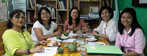 (Left - Right) AFA's Secretary General Ms. Esther Penunia and Policy Advocacy Officer Ms. Maria Elena Rebagay; and SEARCA's Acting Program Head for Research and Development Dr Bessie M. Burgos, Program Specialist Ms. Carmen Nyhria G. Rogel, and ARD2014 Program Associate Ms. Junette Dawn Baculfo