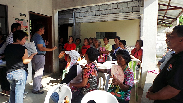 Dr. Prudenciano U. Gordoncillo (third from left) presents the outputs delivered by the SEARCA project team before the members of Samahan ng Magsasaka ng Kaybanban Multipurpose Cooperative during their special General Assembly on 14 August 2014 in Sta. Maria, Bulacan.