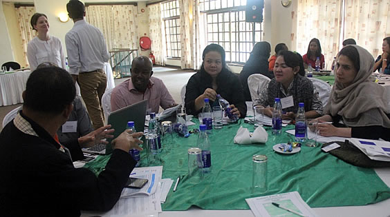 SEARCA BIC Special Projects Coordinator Ms. Maria Monina Cecilia A. Villena discusses biotech communication strategies with international group during the Alliance for Science training on grassroots campaign.