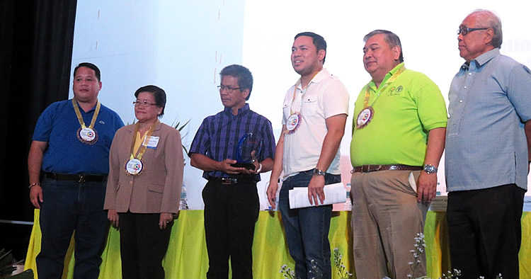Dr. Flor Lantican with PCC Acting Executive Director Dr. Arnel del Barrio and Conference guests of honor.