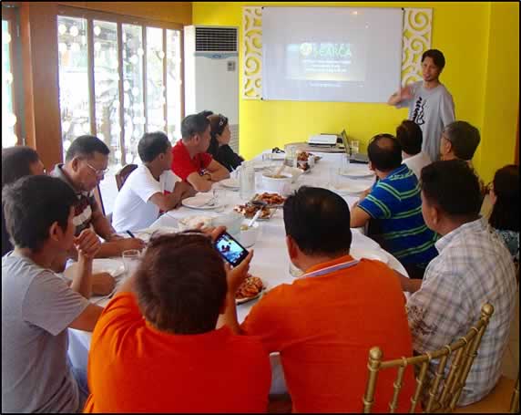 SEARCA Research Specialist, Henry M. Custodio, discussing the  elements of SEARCA’s inclusive and sustainable agricultural and  rural development model and thrusts to local government officials  of Sablayan in Occidental Mindoro.