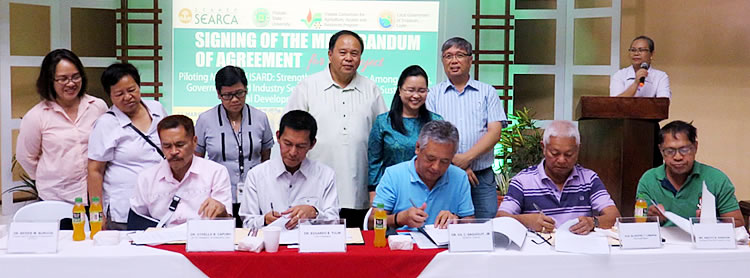 (Front L-R) Dr. Othello Capuno, Dr. Edgardo Tulin, Dr. Gil C. Saguiguit, Jr., Hon. Silvestre Lumarda, Mr. Anecito Asencion – while signing the MOA. (Back L-R) Mrs. Rebecca Macabenta-Cormanes, Dr. Wolfreda T. Alesna, Dr. Vilma Patindol, Dr. Jose Bacusmo, Dr. Bessie Burgos and Prof. Rolando Bello acts as witnesses.