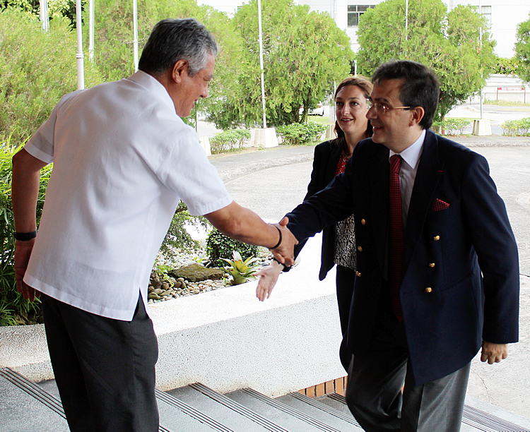 Dr. Saguiguit welcomes Ambassador Mathou on his arrival at SEARCA as Ms. Voron looks on.