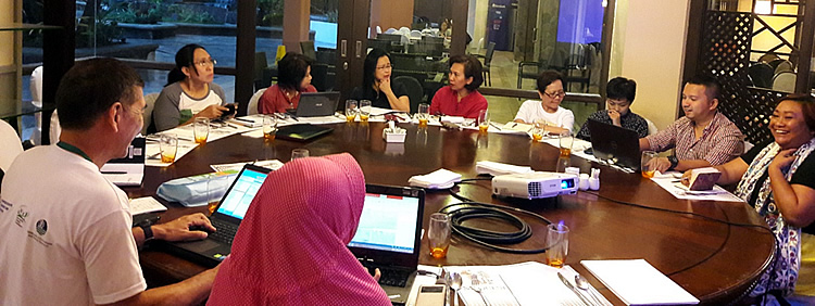 The ASFN–ASFCC partners catch up on the APFW sessions and side events before the ASFCC meeting. Clockwise from left: Ms. Sagita Arhidani, ASFN Secretariat; Ronnakorn Triraganon, RECOFTC; Alfi Syakila, ASFN Secretariat; Dr. Doris Capistrano, ASFCC; Dr. Bessie M. Burgos, SEARCA; Ms. Carmen Nyhria G. Rogel, SEARCA; Ms. Amy M. Lecciones, SEARCA; Ms. Mary Ann Batas, SEARCA; Tomi Haryadi, RECOFTC; and Ms. Cynthia Maharani, CIFOR. [br] Photo courtesy of the ASFN Secretariat