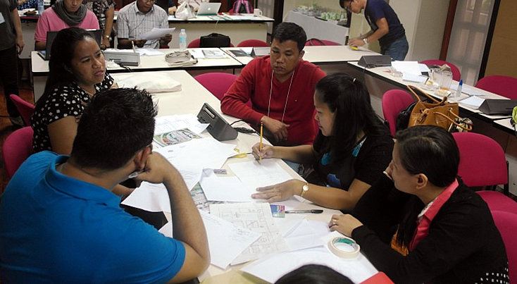 Teachers from Cabuyao Central School work on their action plan.