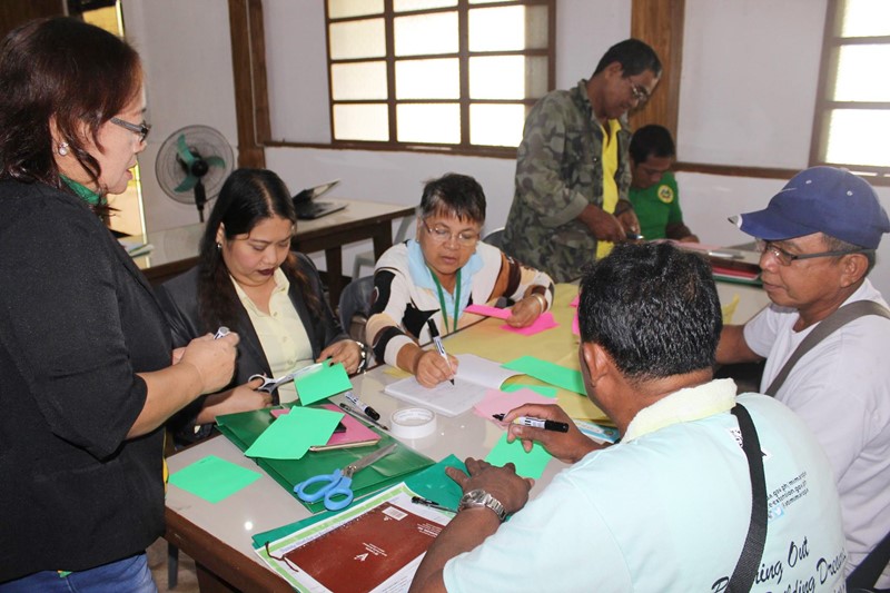 Farmers discussing the RBME plan