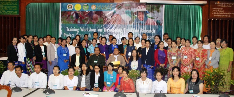 48 HEI and MoALI participants pose with Dr. Tin Htut, Permanent Secretary, MoALI (seated, 3rd from left); Dr. Maria Celeste H. Cadiz of SEARCA (seated beside him); and workshop organizers and resource persons.