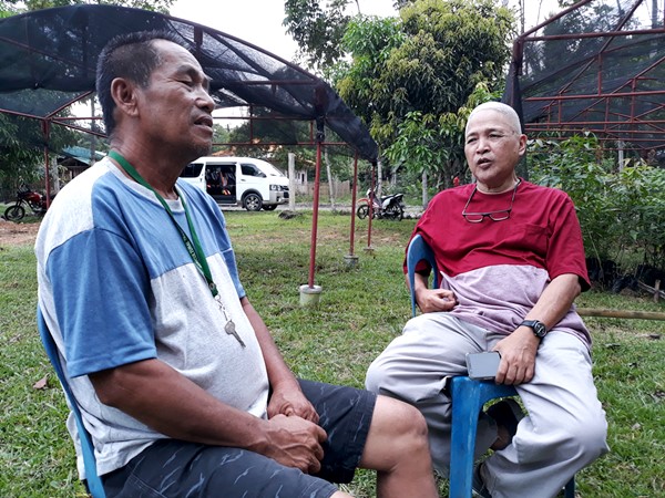 Dr. Jose Medina (right) explaining to Mr. Temeteo Secretaria, IJFA President (left), the importance of sustaining a reliable source of viable jackfruit propagules within the area